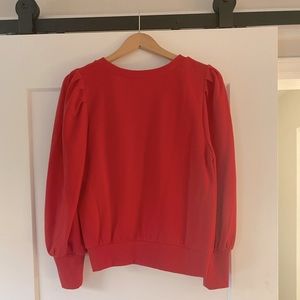 Red puff shoulder shirt